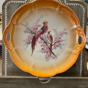 Vintage Orange Decorative Plate with Bird Design